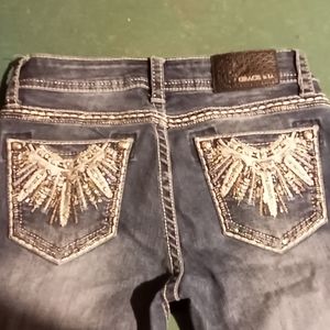 Grace in L.A. Bootcut size 27 blue jeans